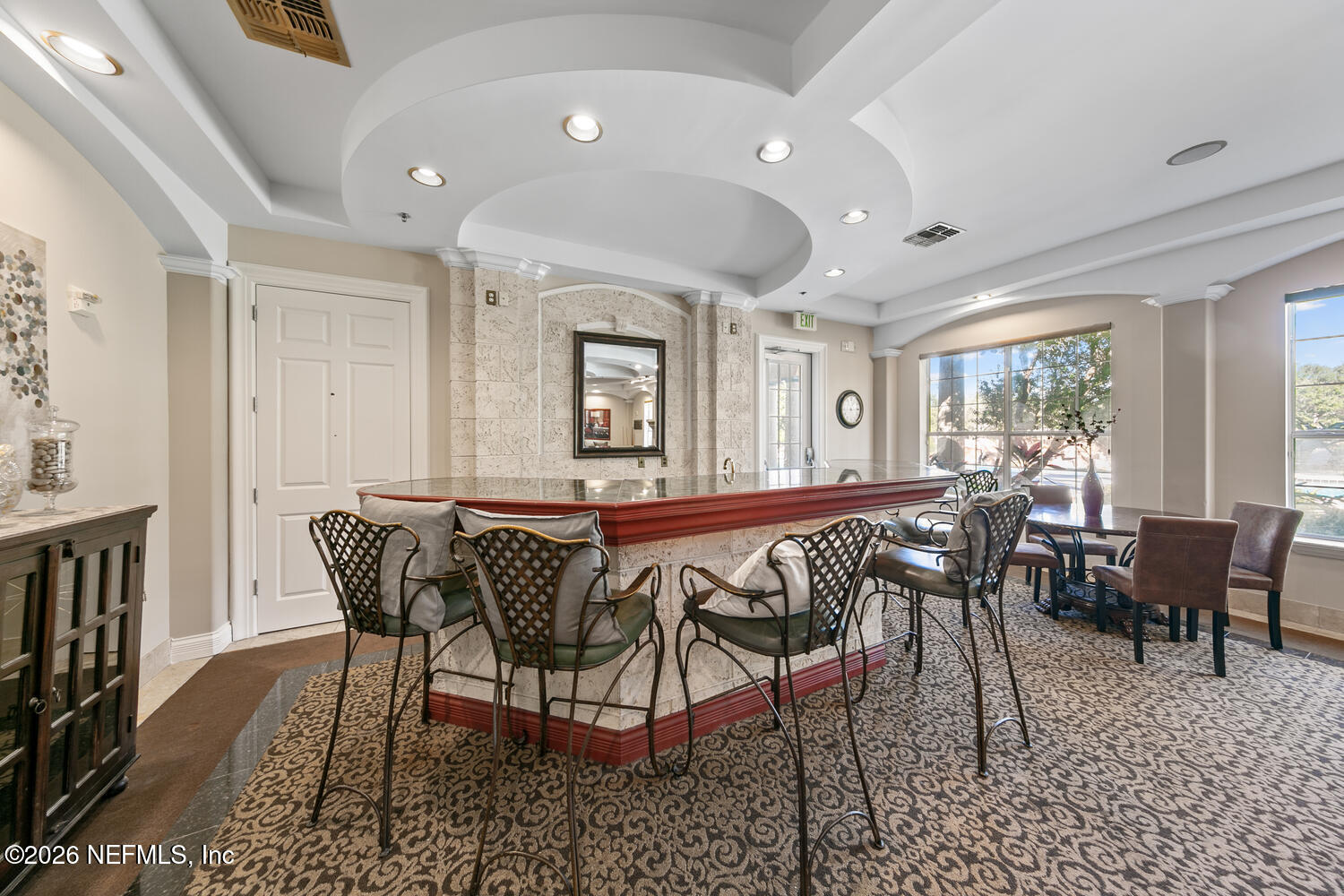 10961 Burnt Mill Road, Unit 317 Jacksonville, FL 32256 - Photo 35 of 39 a dining room with furniture and window