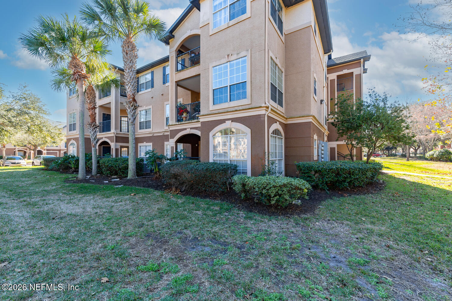 10961 Burnt Mill Road, Unit 317 Jacksonville, FL 32256 - Photo 39 of 39 a view of a house with a yard