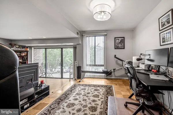 a living room with fireplace furniture and a flat screen tv