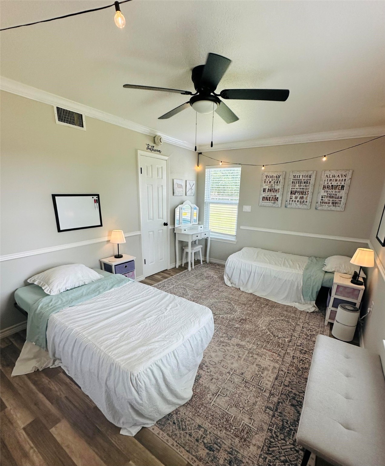 518 Anton Stade Road Rosenberg, TX 77471 - Photo 19 of 37 a bedroom with a bed and window