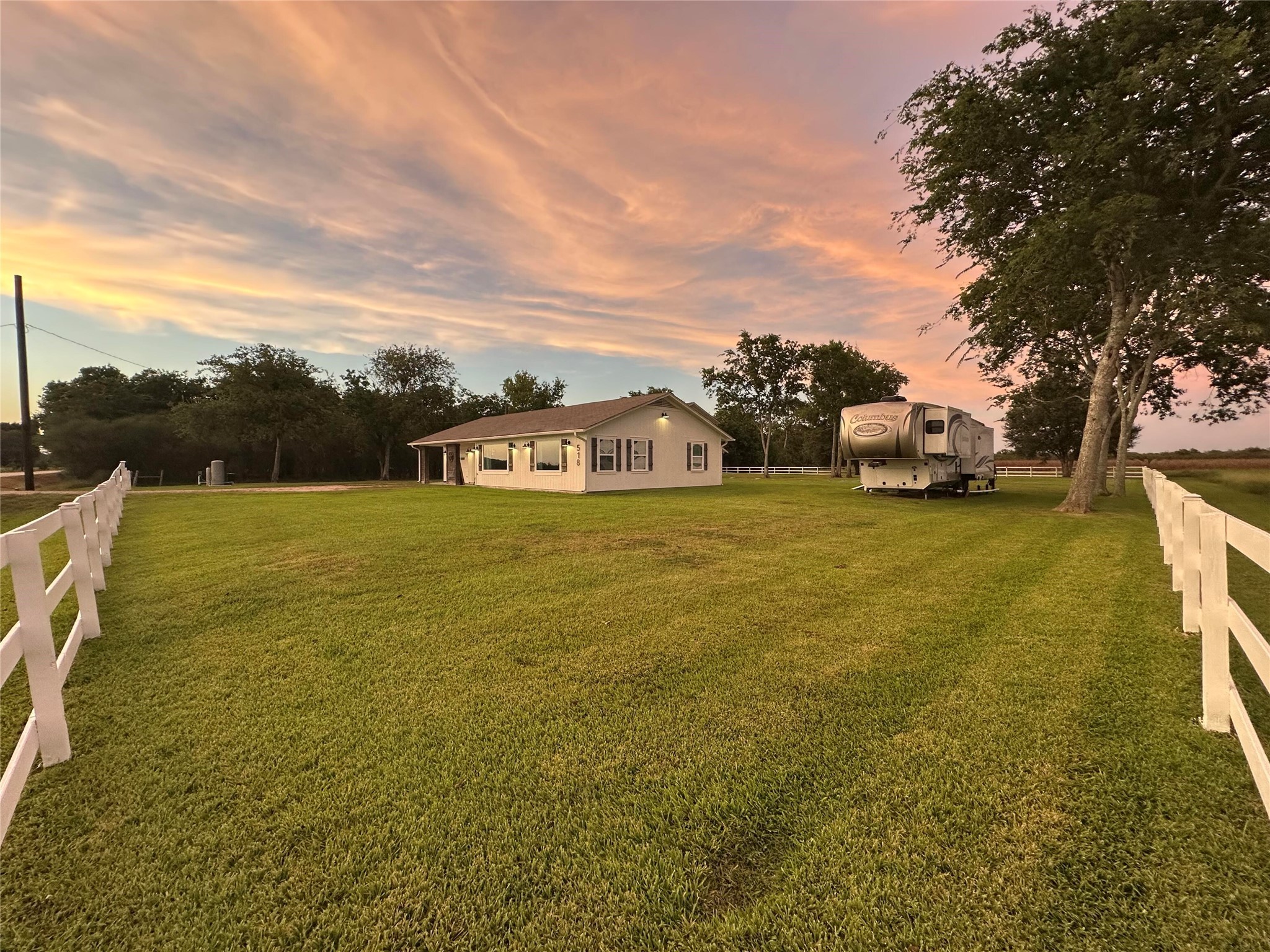 518 Anton Stade Road Rosenberg, TX 77471 - Photo 2 of 37 a view of a lake with houses