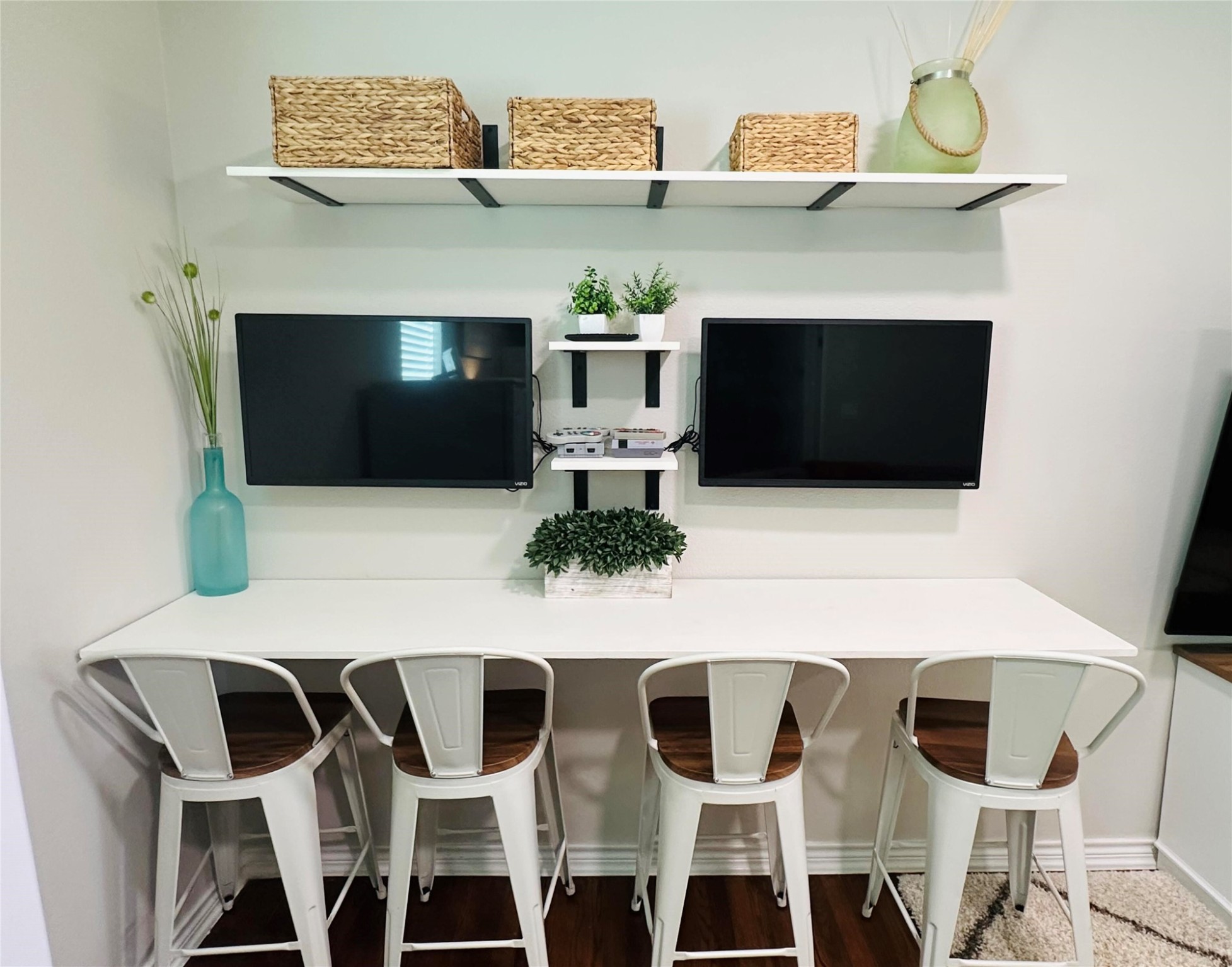 518 Anton Stade Road Rosenberg, TX 77471 - Photo 24 of 37 a living room with a fireplace a flat screen tv and chairs