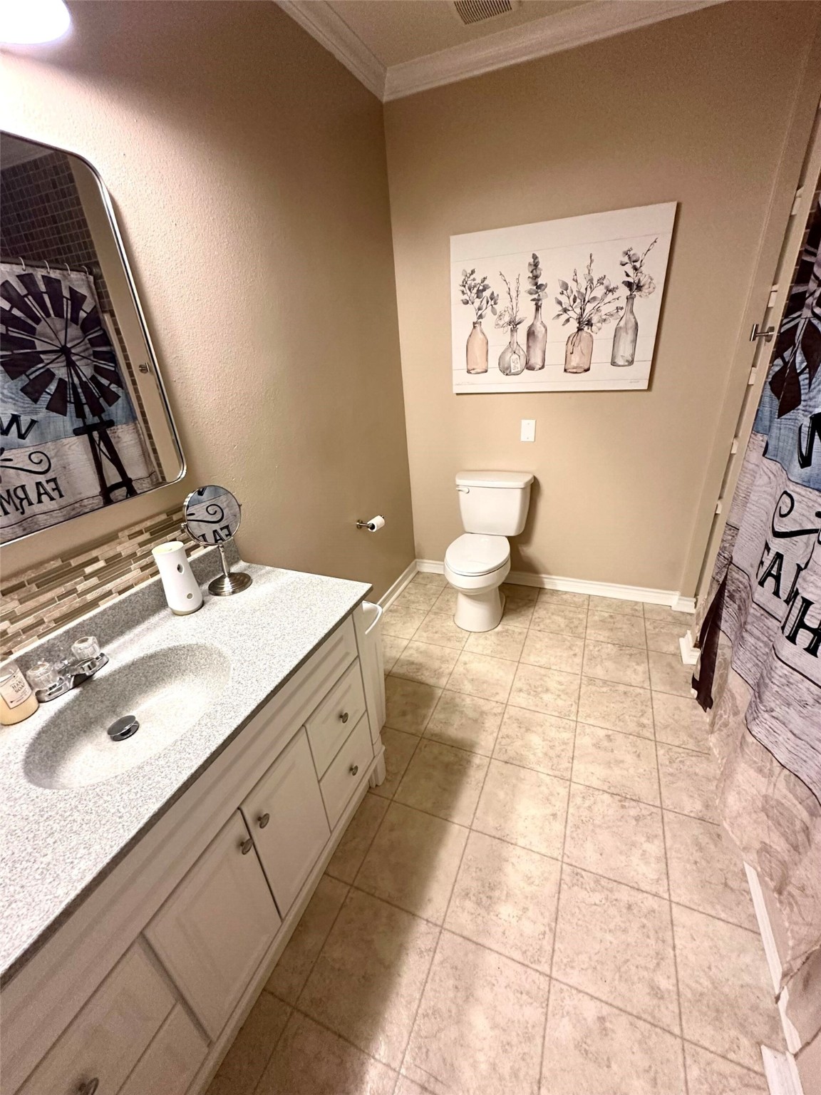 518 Anton Stade Road Rosenberg, TX 77471 - Photo 27 of 37 a bathroom with a sink mirror and vanity