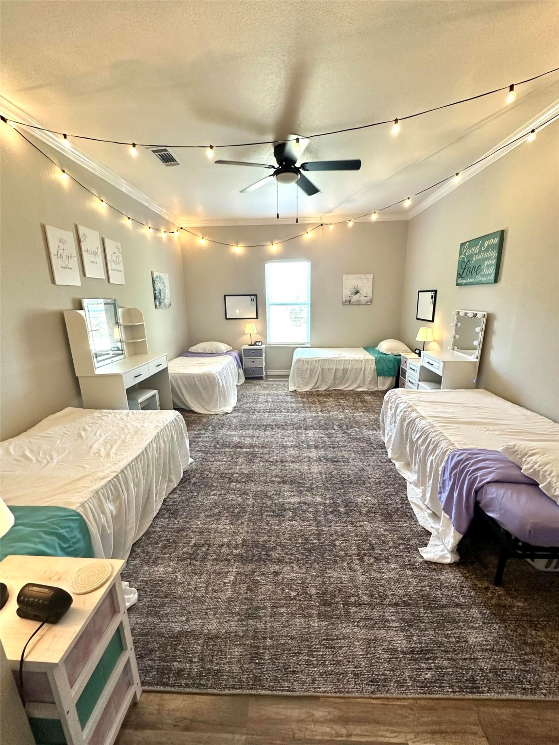 518 Anton Stade Road Rosenberg, TX 77471 - Photo 28 of 37 a spacious bedroom with two beds and a chandelier