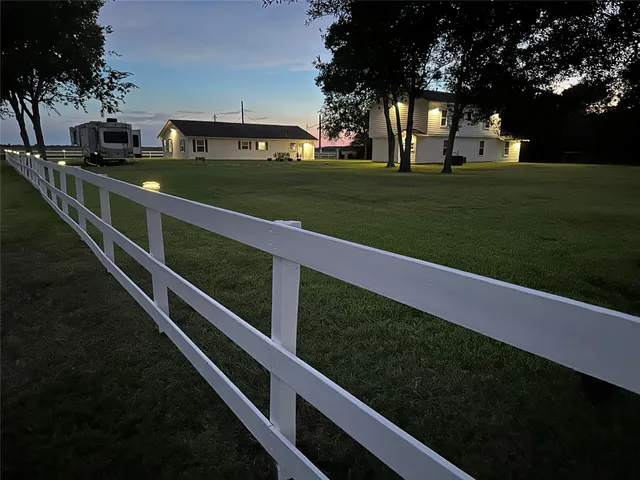 a view of a wooden deck and city view