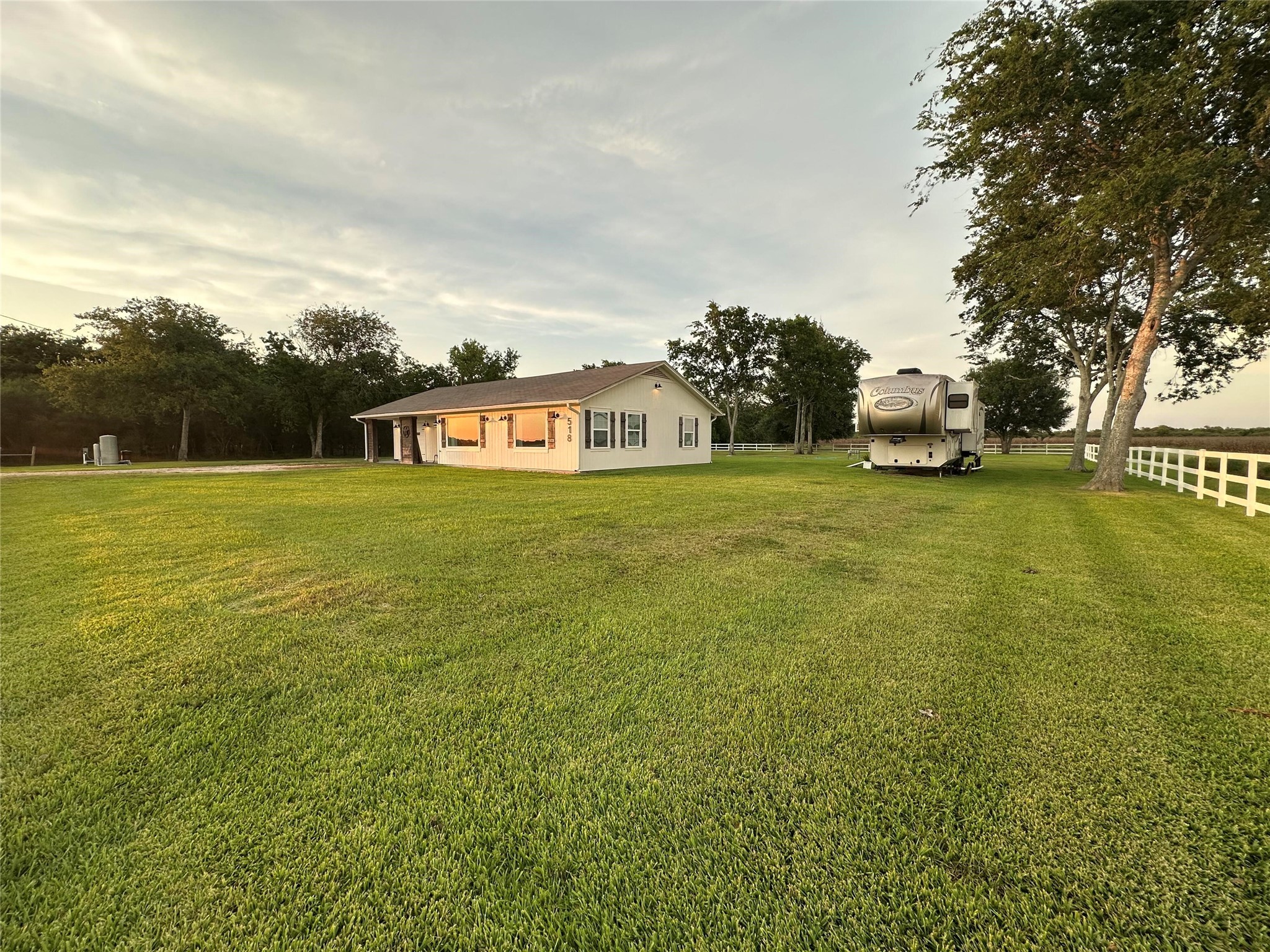 518 Anton Stade Road Rosenberg, TX 77471 - Photo 36 of 37 a view of a big yard with plants and large trees