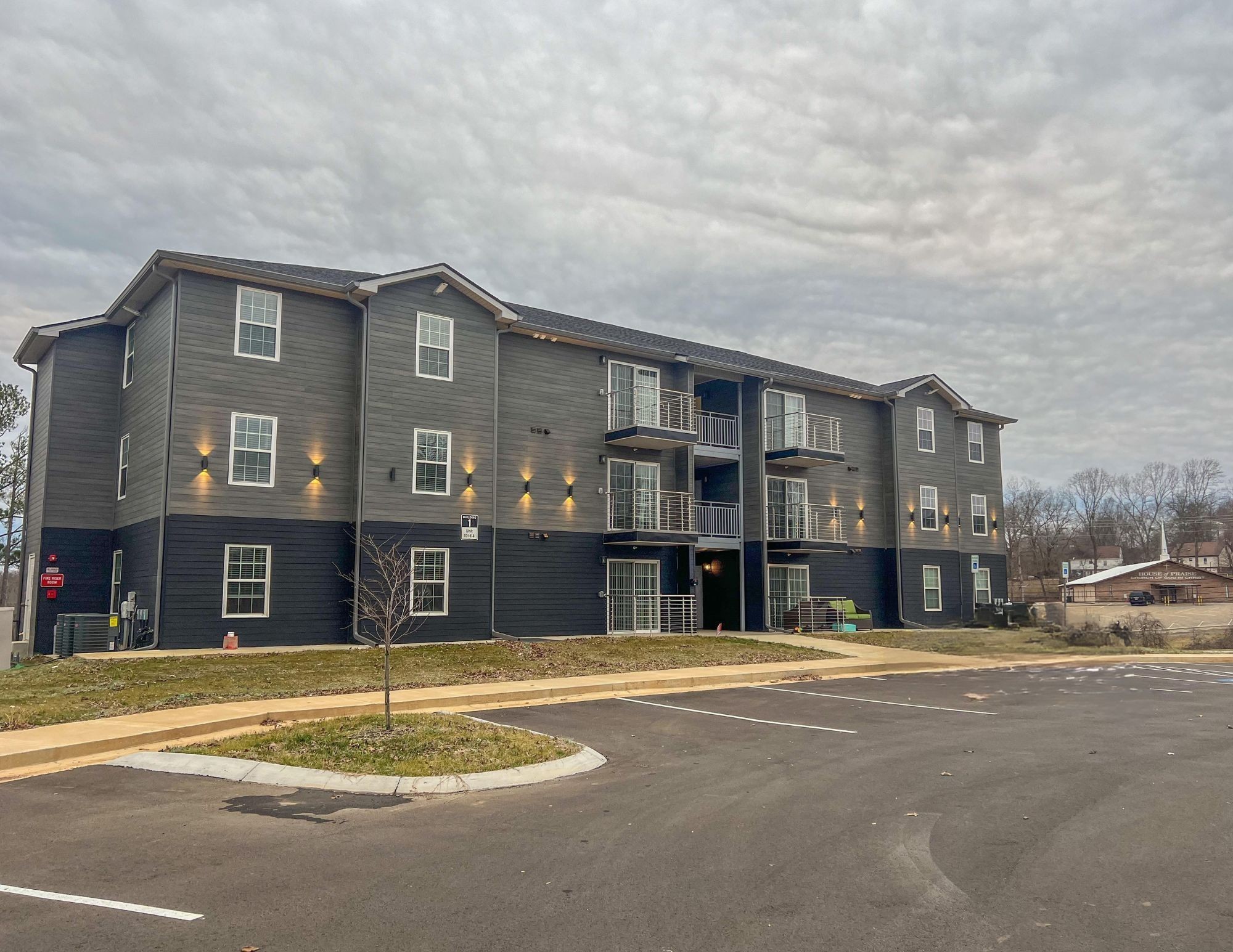 a view of a building with a street