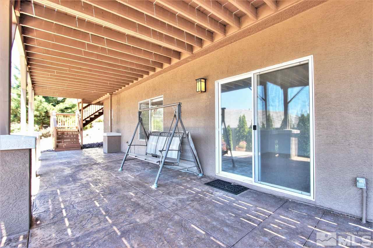 1094 University Ridge Drive Reno, NV 89512 - Photo 15 of 23 a view of an empty room with a balcony