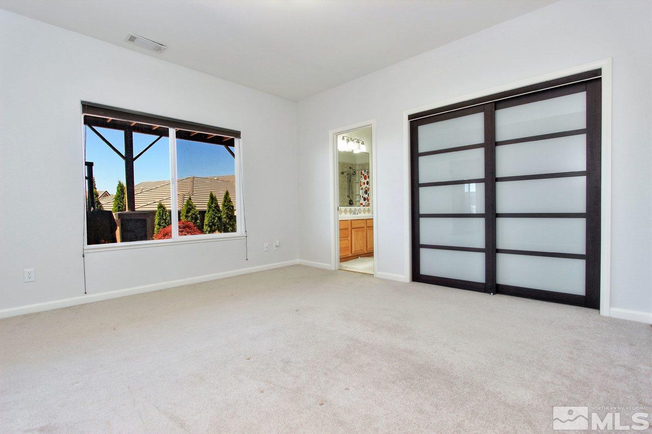1094 University Ridge Drive Reno, NV 89512 - Photo 17 of 23 a view of an empty room with a window