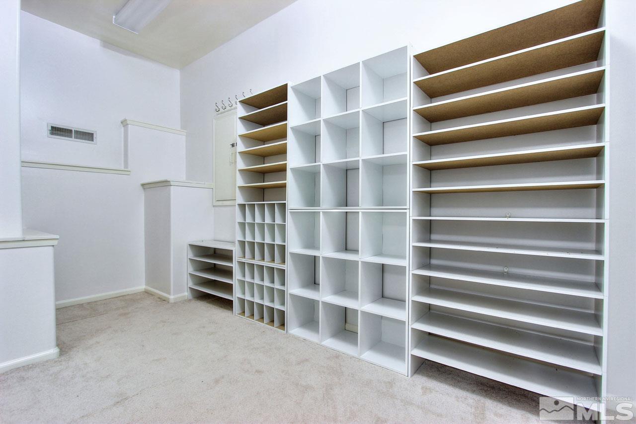 1094 University Ridge Drive Reno, NV 89512 - Photo 20 of 23 a view of walk in closet with empty racks