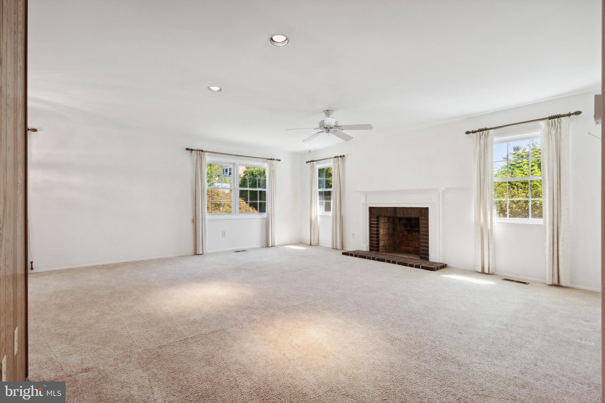 13120 Poplar Tree Road Fairfax, VA 22033 - Photo 6 of 31 Living Room with Wood Burning Fireplace