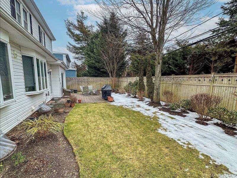 16 Wright Road Rockville Centre, NY 11570 - Photo 19 of 23 a view of backyard with swimming pool and seating space