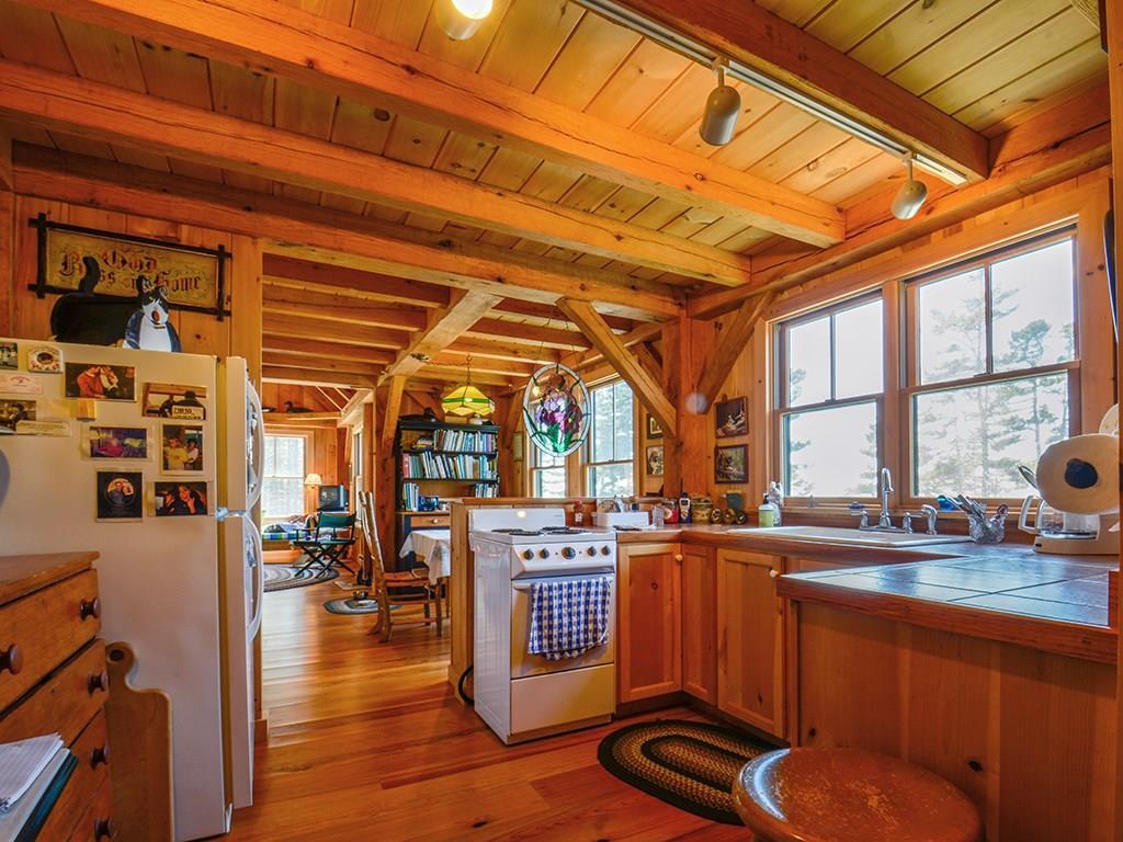 555 Jericho Bay Road Swans Island, ME 04685 - Photo 19 of 35 Efficiently designed kitchen with...