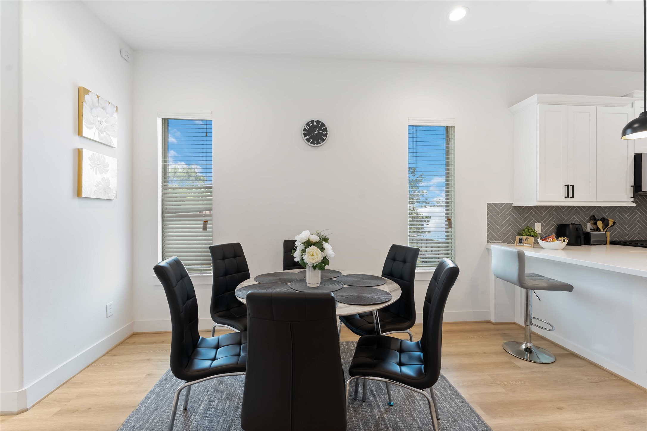 2341 Eagle Street Houston, TX 77004 - Photo 13 of 30 a view of a dining room with furniture and a window