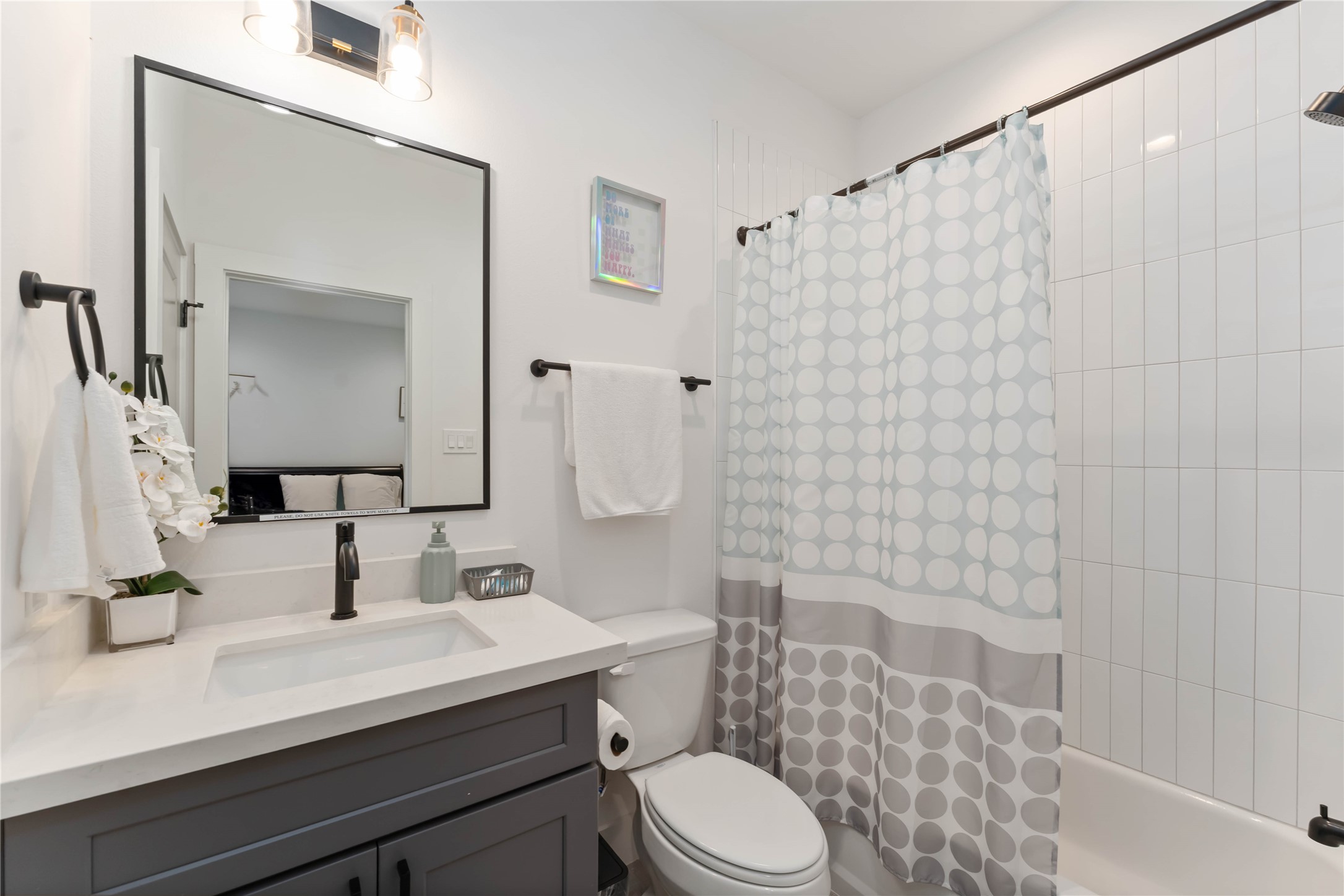 2341 Eagle Street Houston, TX 77004 - Photo 6 of 30 a bathroom with a sink a toilet and shower