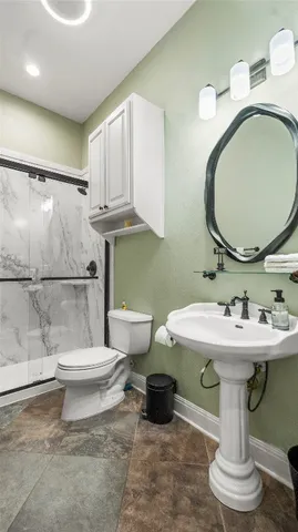 a view of a chairs and table in a patio