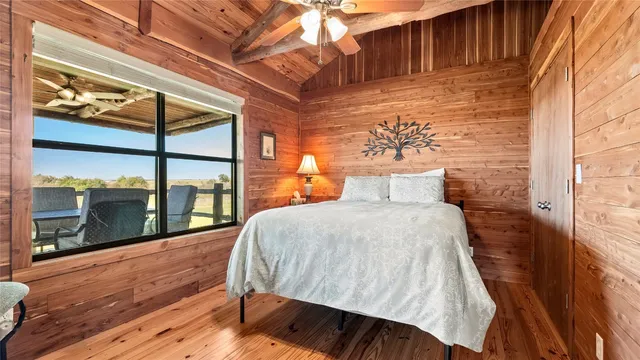 a bathroom with a sink toilet and mirror