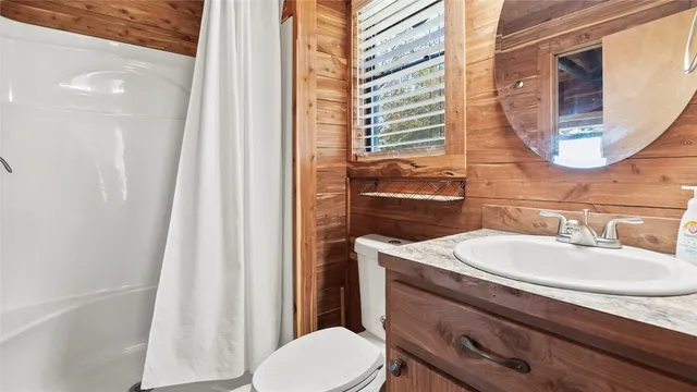 a view of a kitchen with furniture and a fireplace