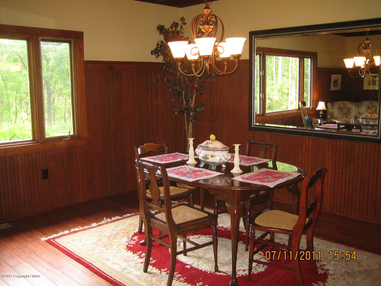 Henry Price Road Cresco, PA 18326 - Photo 12 of 36 a view of a dining room with furniture and window