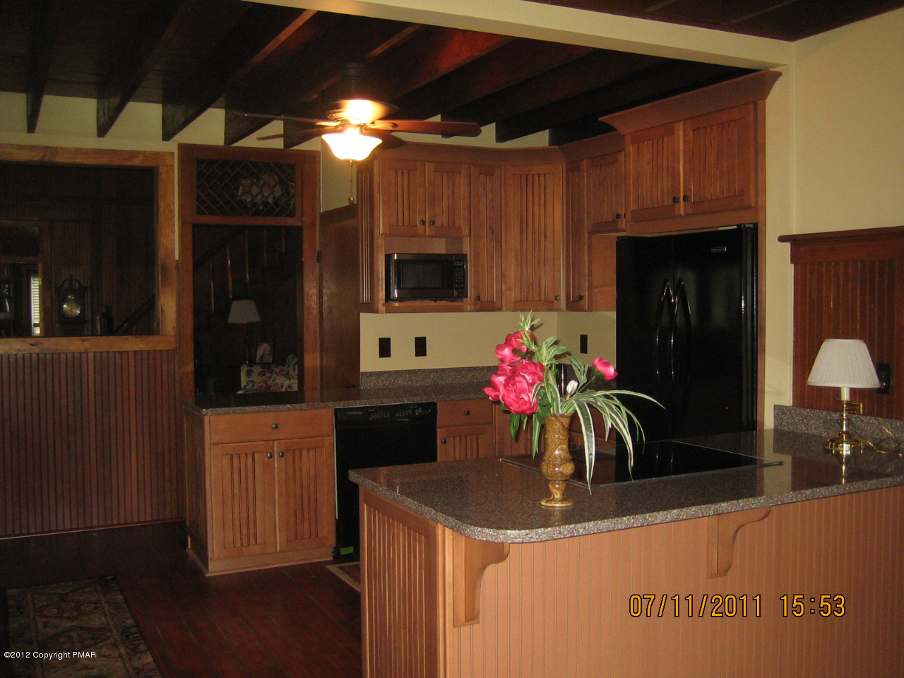 Henry Price Road Cresco, PA 18326 - Photo 13 of 36 a kitchen with a sink and cabinets