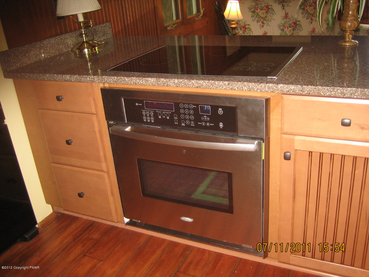 Henry Price Road Cresco, PA 18326 - Photo 17 of 36 a stove top oven sitting inside of a kitchen
