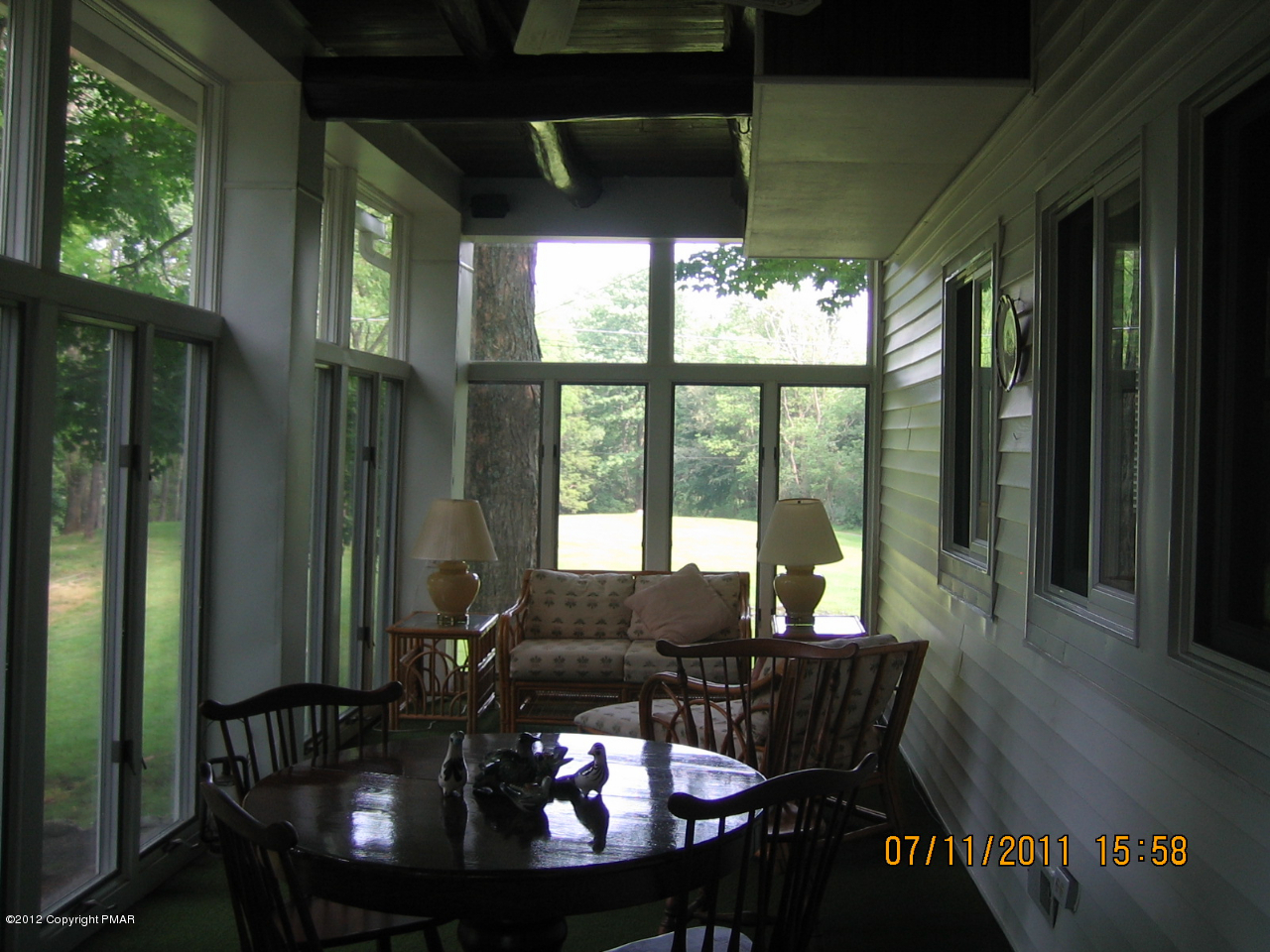 Henry Price Road Cresco, PA 18326 - Photo 21 of 36 a view of a dining room with furniture window and outside view