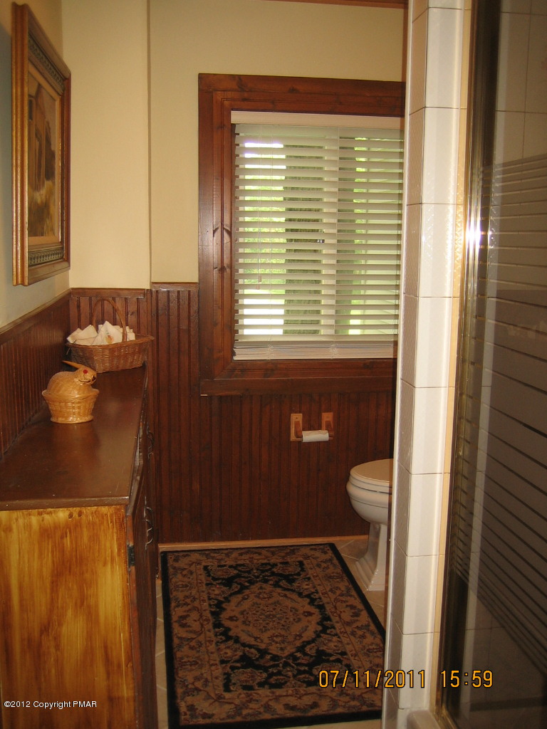 Henry Price Road Cresco, PA 18326 - Photo 23 of 36 a bathroom with a toilet