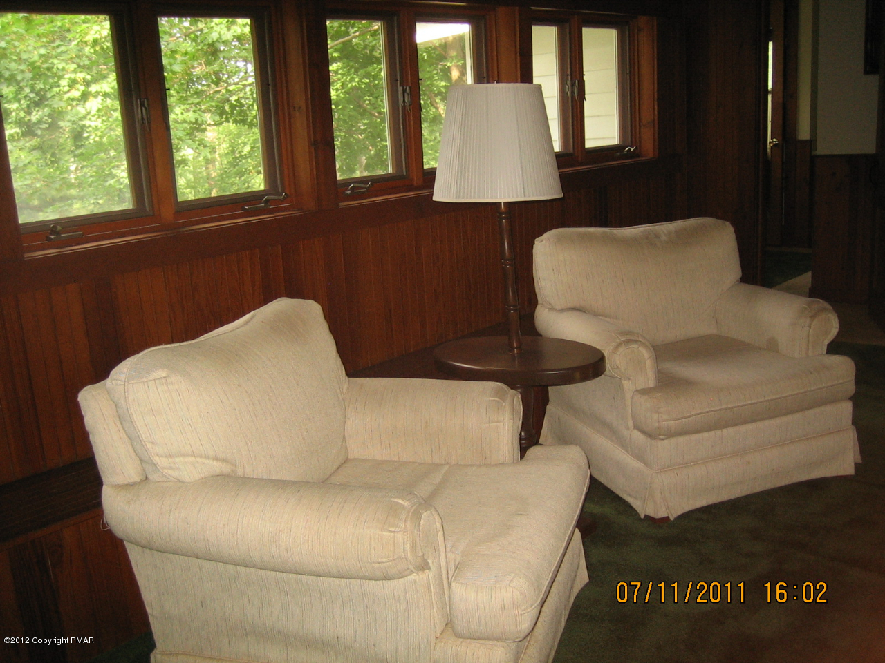Henry Price Road Cresco, PA 18326 - Photo 26 of 36 a living room with furniture and a window