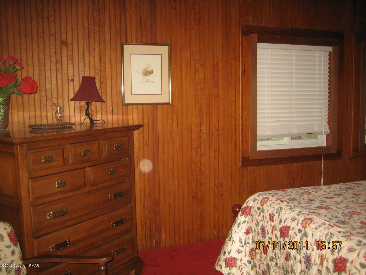 Henry Price Road Cresco, PA 18326 - Photo 27 of 36 a bedroom with a bed and a dresser