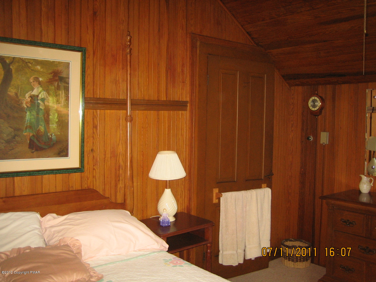 Henry Price Road Cresco, PA 18326 - Photo 31 of 36 a bedroom with a bed and a dresser