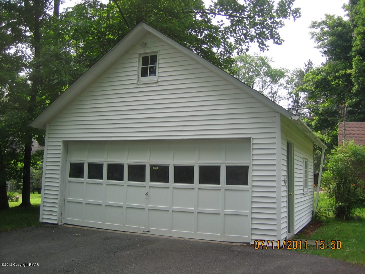Henry Price Road Cresco, PA 18326 - Photo 34 of 36 a front view of a house with a yard