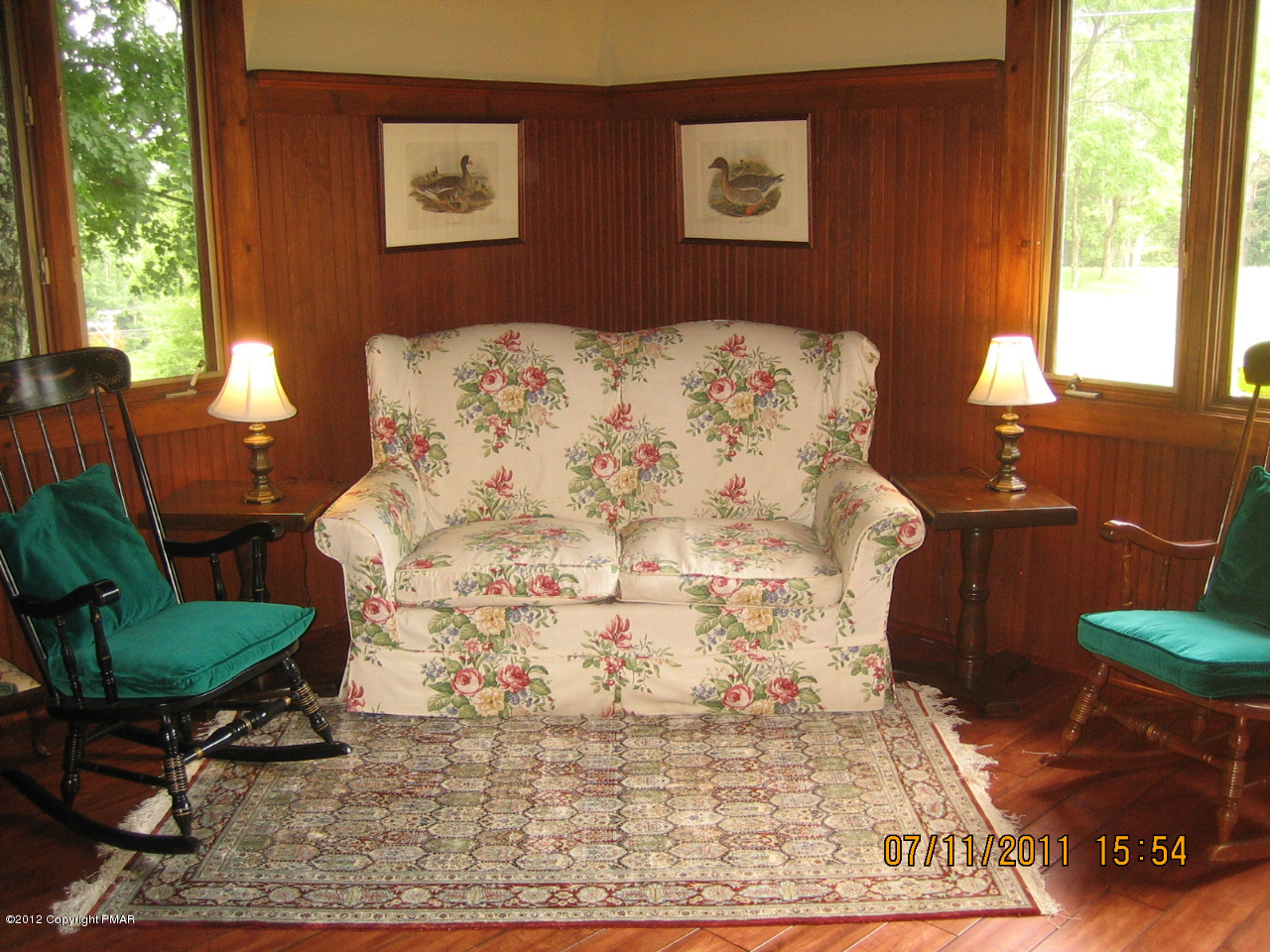 Henry Price Road Cresco, PA 18326 - Photo 5 of 36 a bed sitting in a bedroom next to a window