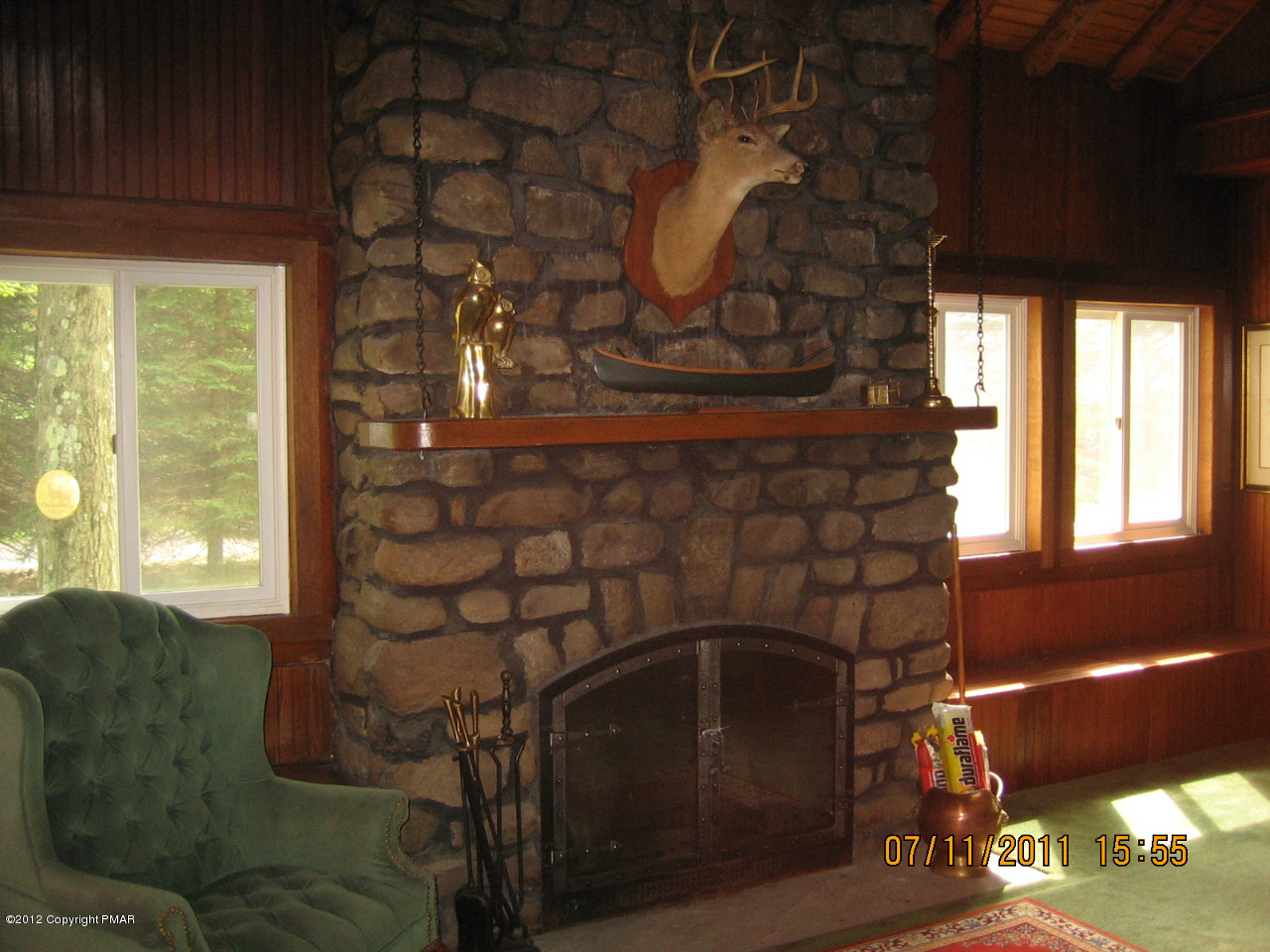 Henry Price Road Cresco, PA 18326 - Photo 6 of 36 a living room with a fireplace