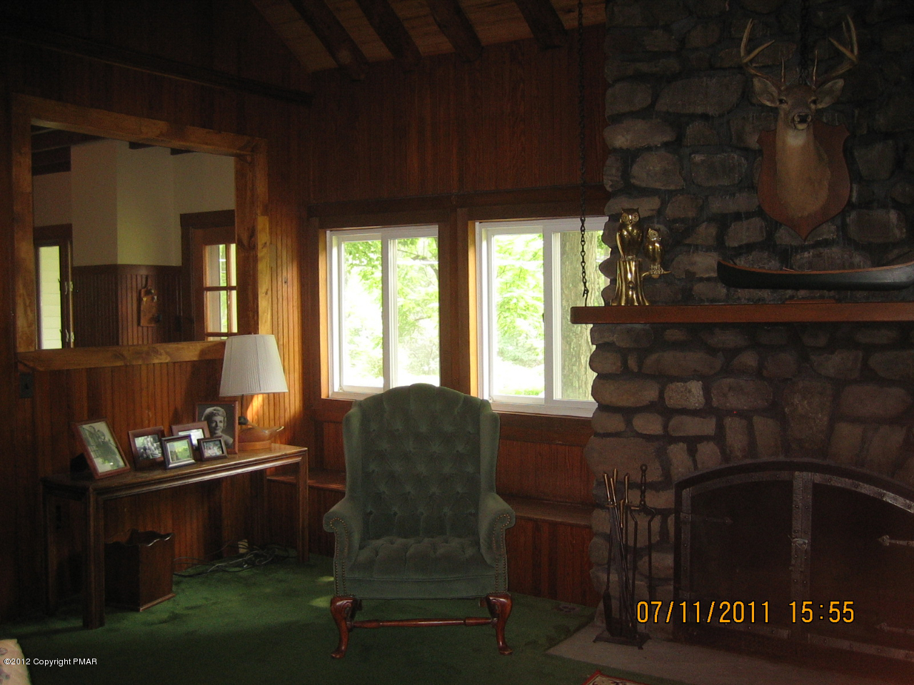Henry Price Road Cresco, PA 18326 - Photo 7 of 36 a living room with furniture and a fireplace