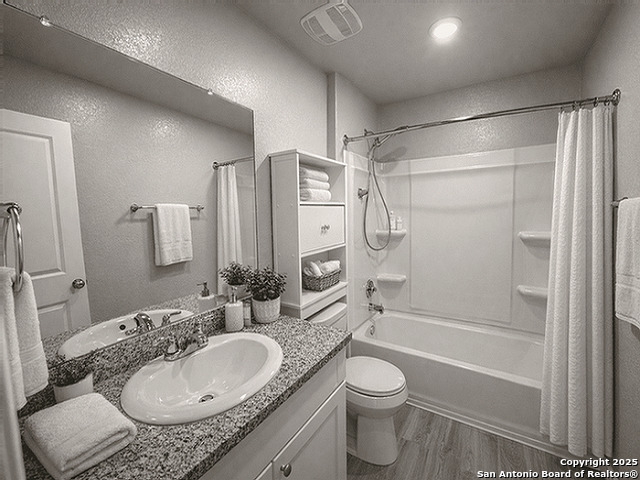 431 Ambush Ridge San Antonio, TX 78220 - Photo 10 of 17 a bathroom with a granite countertop sink toilet and shower