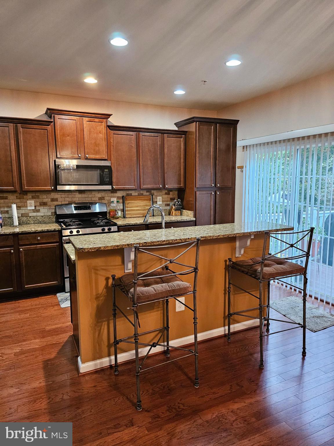 8543 Crooked Tree Lane Laurel, MD 20724 - Photo 4 of 20 Gourmet kitchen with granite and cherry cabinets