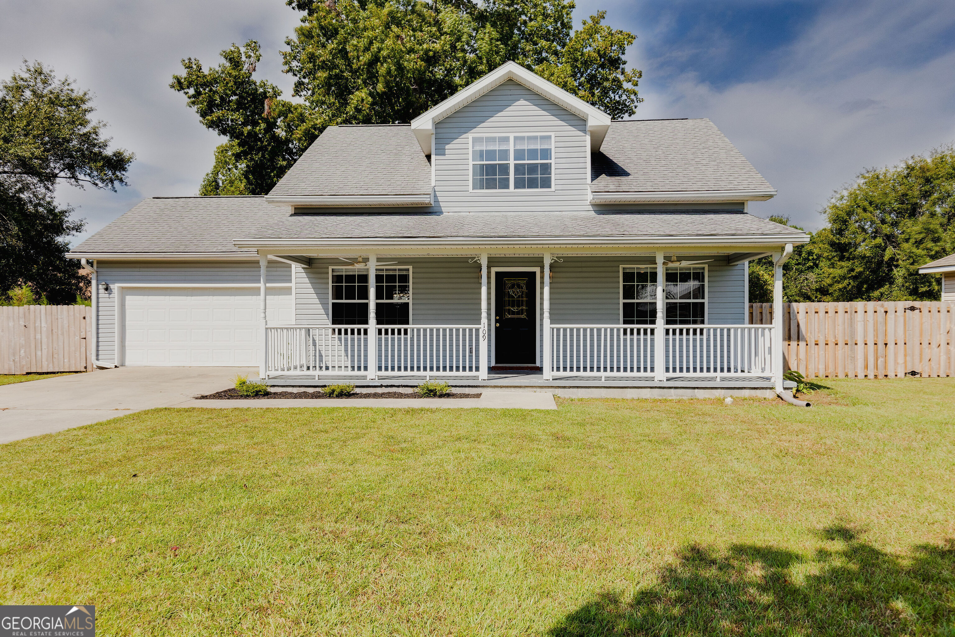 109 Maple Drive Rincon, GA 31326 - Photo 1 of 1 a front view of a house with a swimming pool