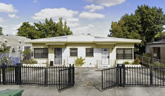 a front view of a house with a porch