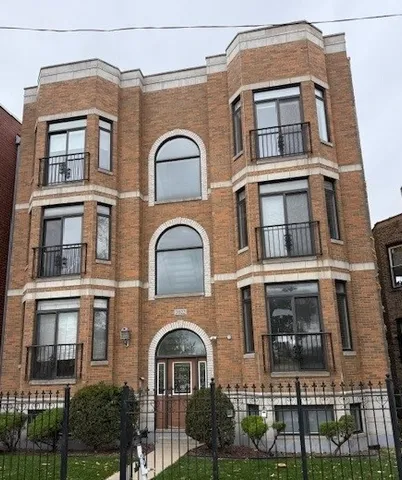 a front view of a multi story residential apartment building