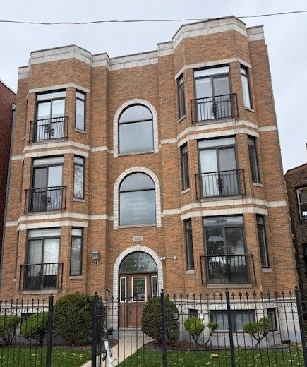 a front view of a multi story residential apartment building