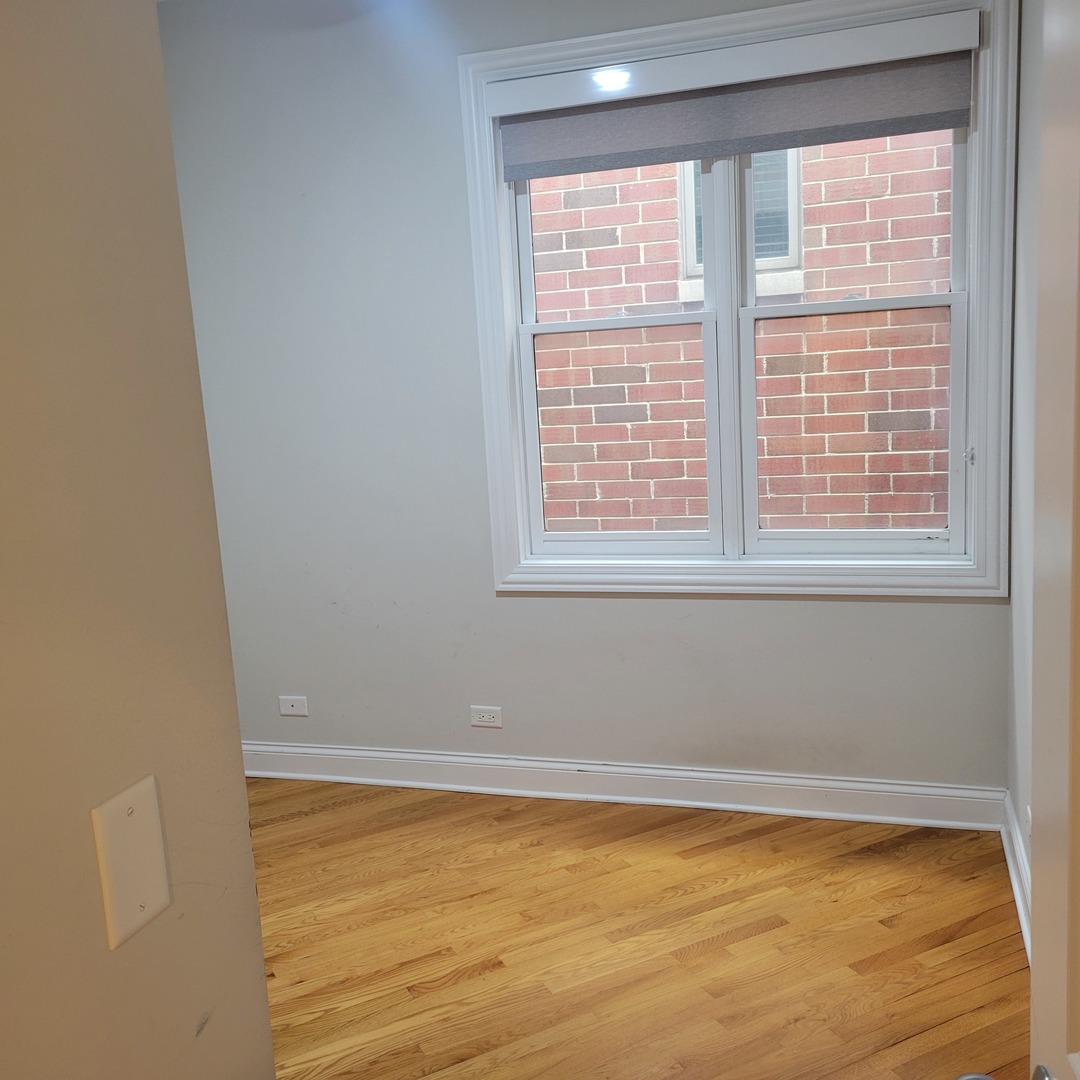 2022 North Wood Street, Unit 3S Chicago, IL 60614 - Photo 15 of 20 a view of a room with a window