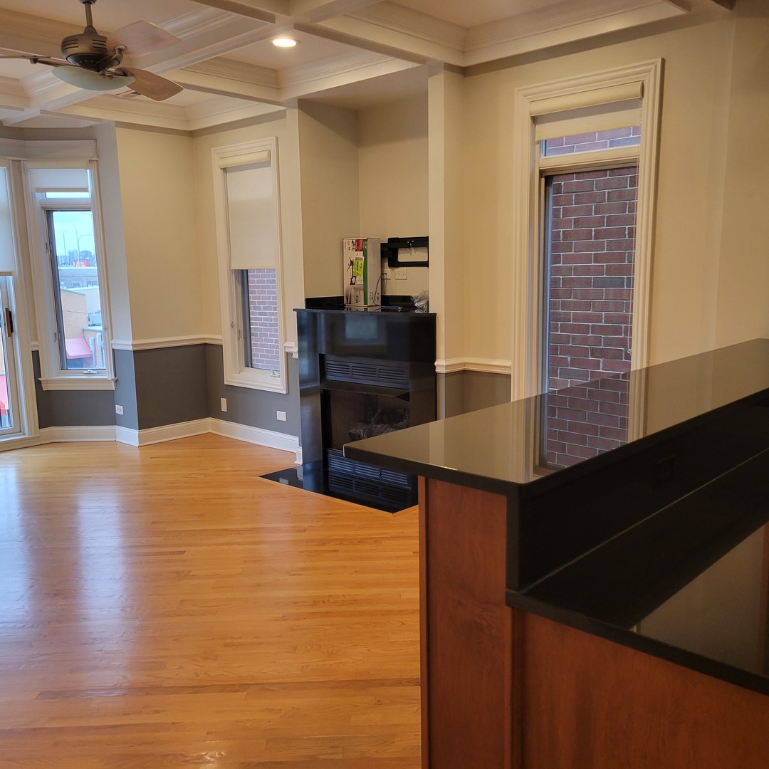 2022 North Wood Street, Unit 3S Chicago, IL 60614 - Photo 3 of 20 a view of a workspace with furniture