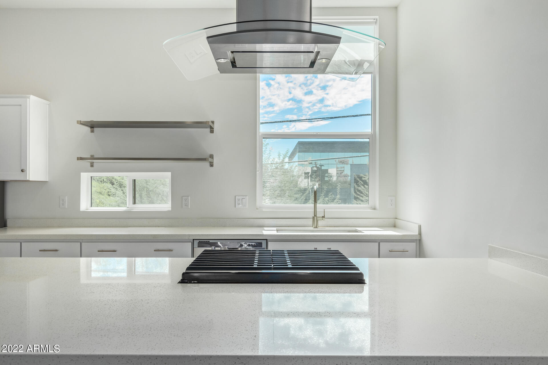 325 East Coronado Road, Unit 16 Phoenix, AZ 85004 - Photo 13 of 36 a bathroom with a bathtub window and cabinets