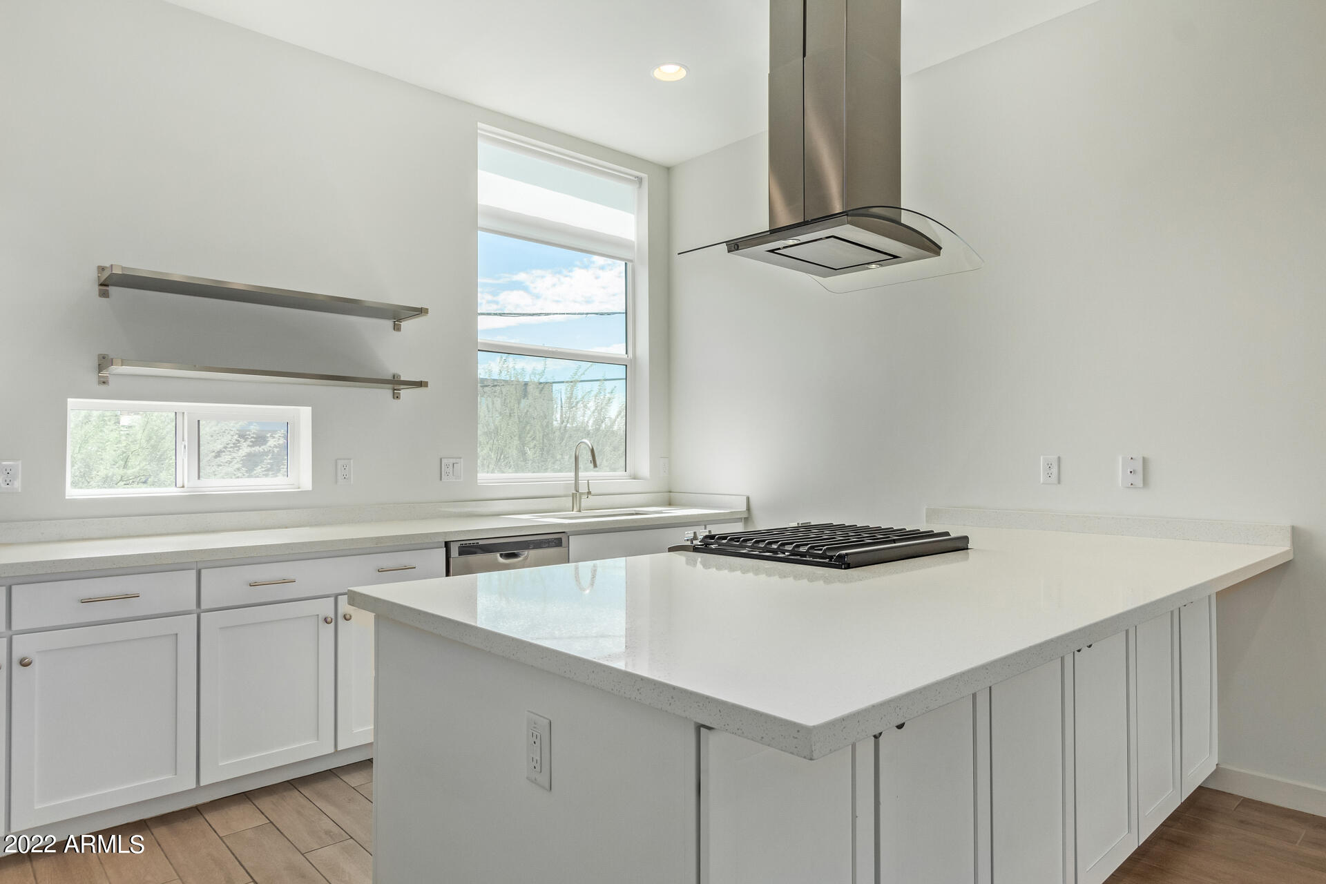 325 East Coronado Road, Unit 16 Phoenix, AZ 85004 - Photo 14 of 36 a kitchen with stainless steel appliances a sink a stove and cabinets