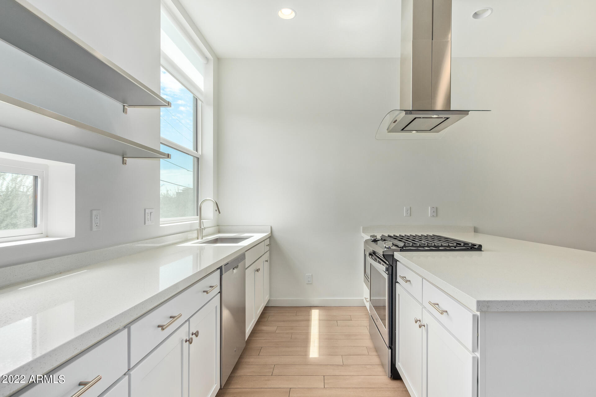 325 East Coronado Road, Unit 16 Phoenix, AZ 85004 - Photo 15 of 36 a utility room with cabinets washer and dryer