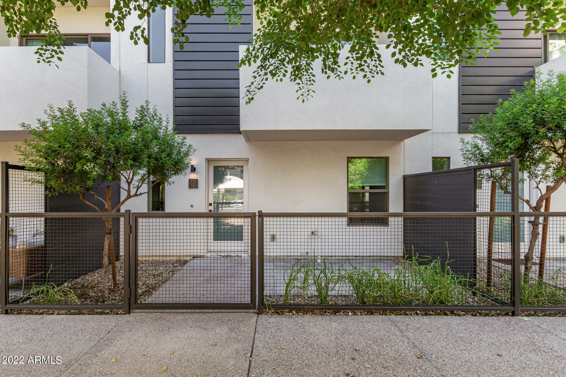 325 East Coronado Road, Unit 16 Phoenix, AZ 85004 - Photo 2 of 36 a view of house with outdoor space