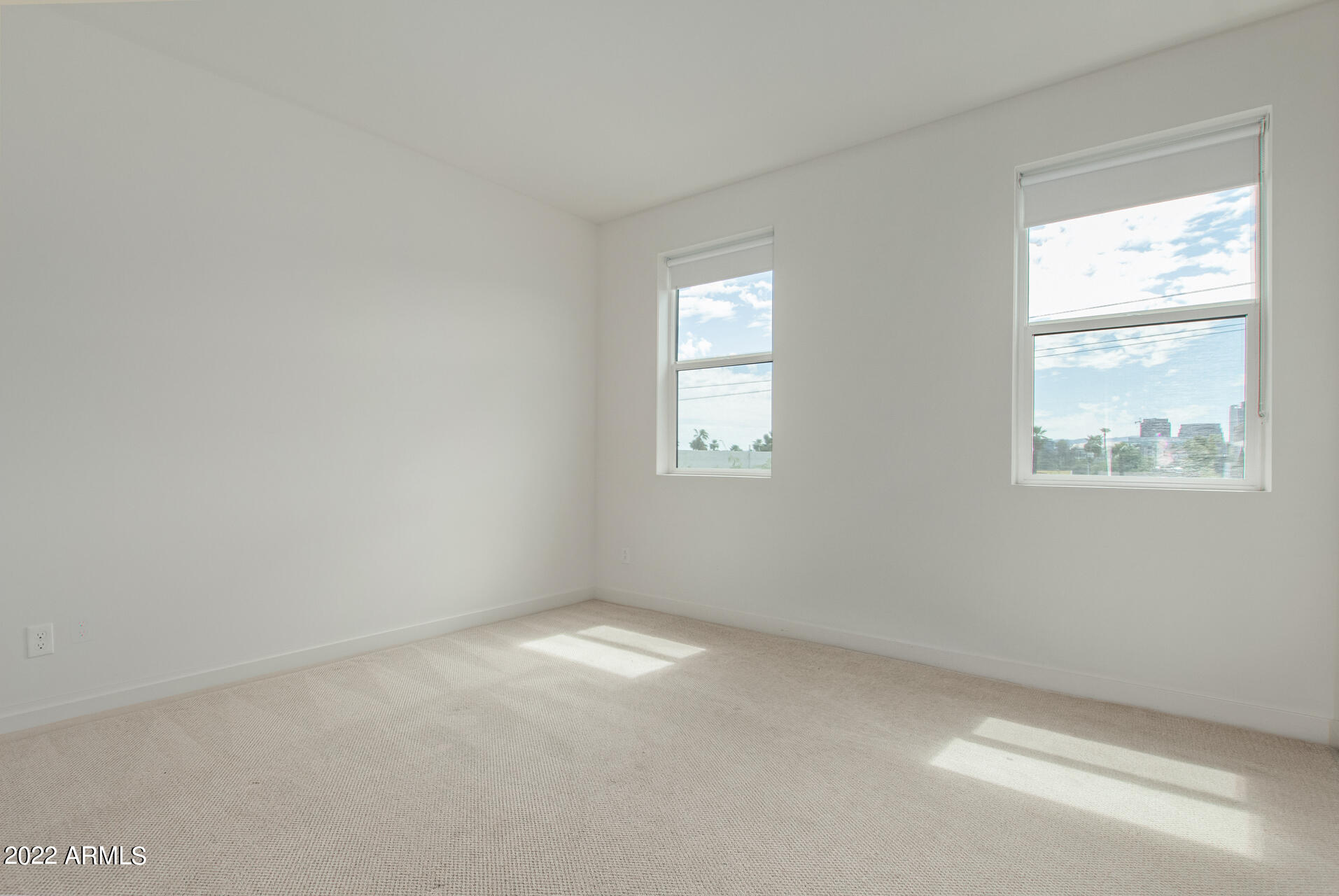 325 East Coronado Road, Unit 16 Phoenix, AZ 85004 - Photo 27 of 36 an empty room with windows