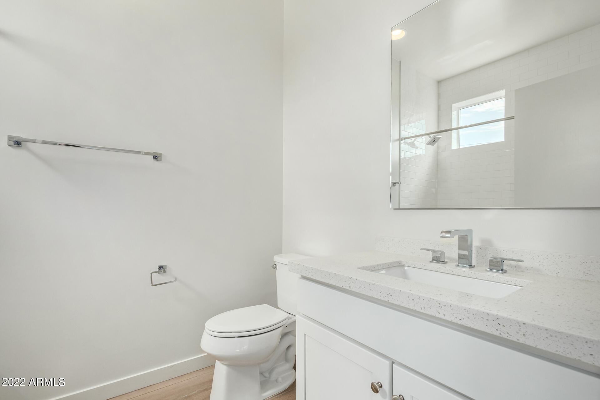 325 East Coronado Road, Unit 16 Phoenix, AZ 85004 - Photo 28 of 36 a bathroom with a granite countertop sink a toilet and a mirror
