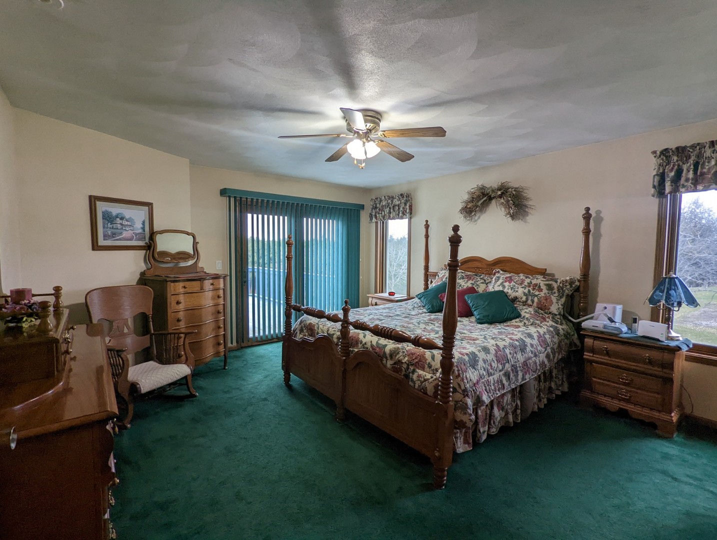 8597 East Winneshiek Road Ridott, IL 61067 - Photo 21 of 49 a bedroom with bed and window