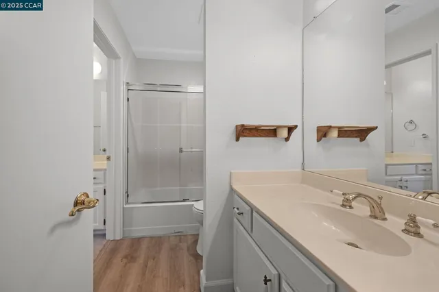 a bathroom with a sink and mirror